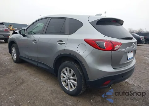 2013 Mazda Cx-5 Touring z USA, uszkodzony, nr VIN JM3KE2CE7D0120615